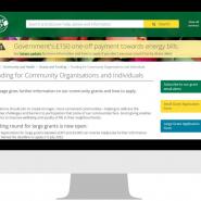 graphic that shows a computer monitor which has the community grant funding page open on the East Herts website